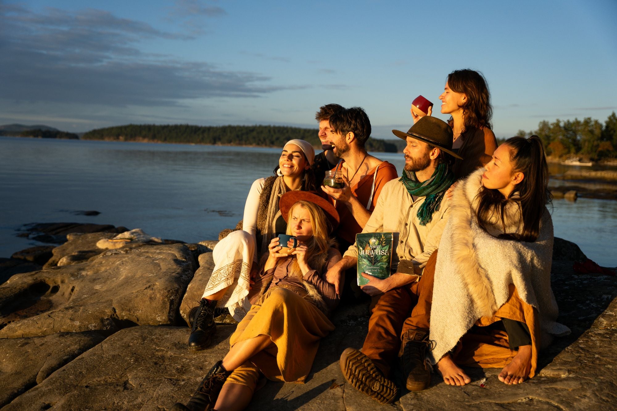 Upina community gathering by the water